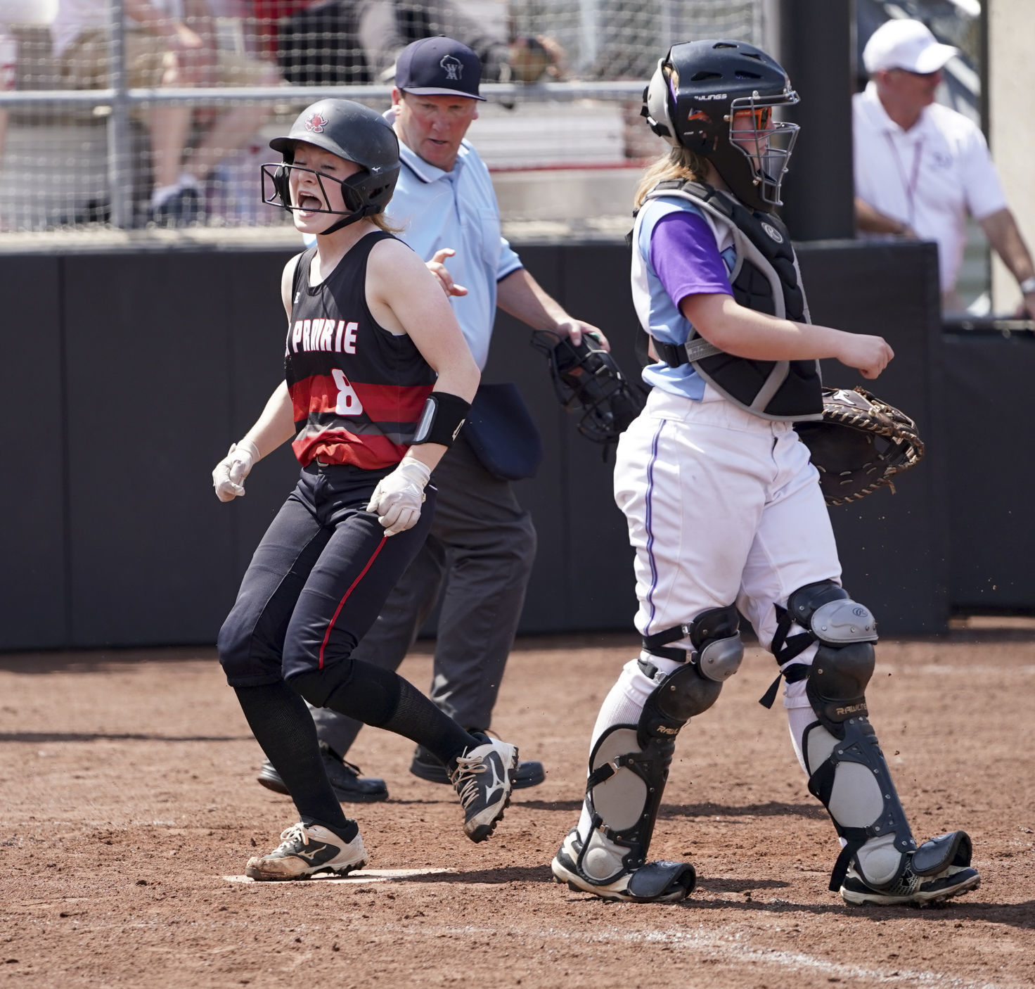WIAA state softball photo: Sun Prairie's Chloe Knoernschild celebrates scoring the go-ahead run